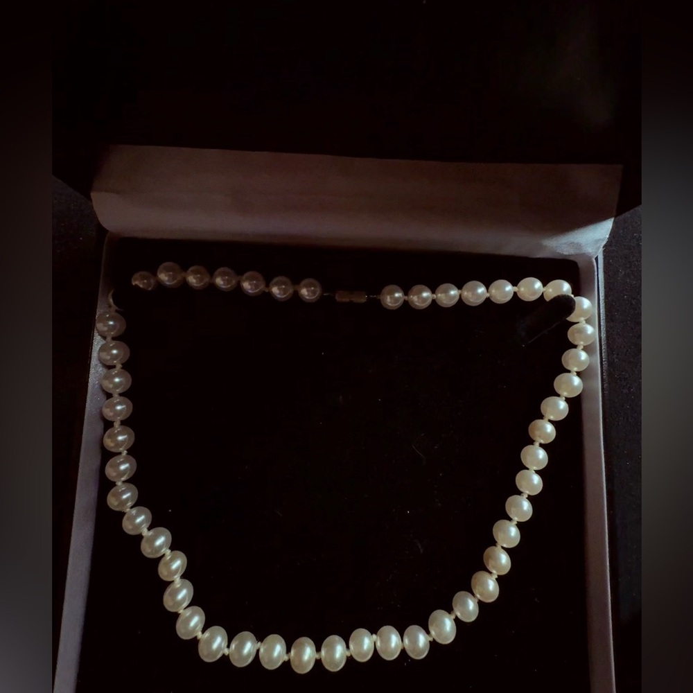 Pearl silk strand necklace
